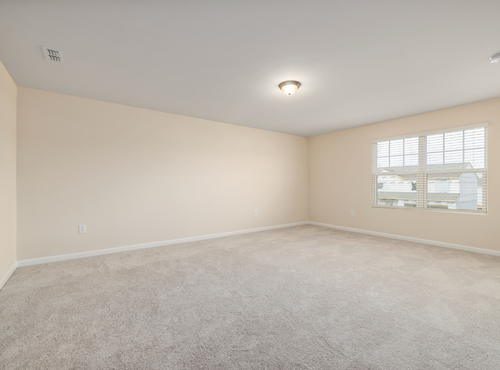 This is a photo of an empty room with cream carpets works carried out by Worcester Park Carpet Cleaning