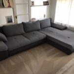 This is a photo of a grey L shape sofa that has been professionally steam cleaned, also the beige carpets have been steam cleaned too works carried out by Worcester Park Carpet Cleaning